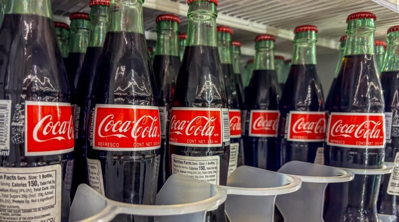 Coca-Cola tops estimates, raises earnings outlook as global beverage demand rises