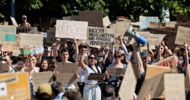Ukrainians take to the streets after Zelenskyy ousts defense minister in surprise shake-up